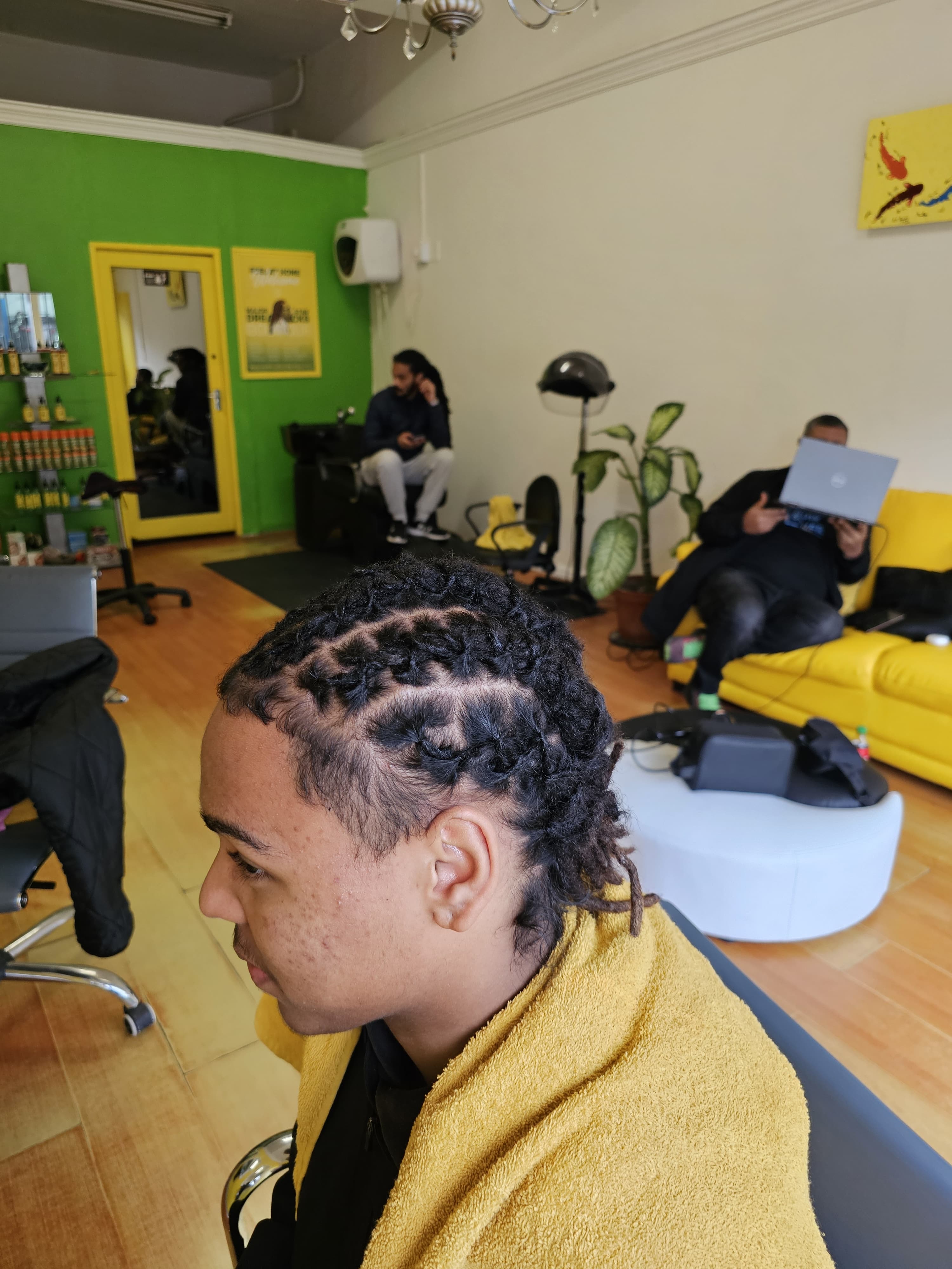 Client smiling with fresh locs