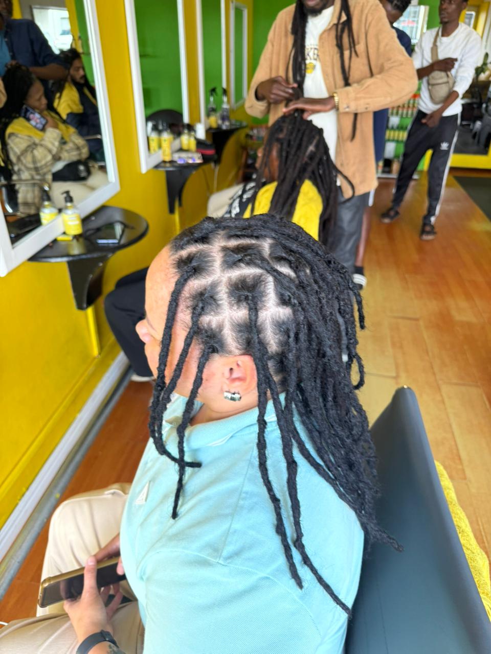 Smiling woman with dreadlocks