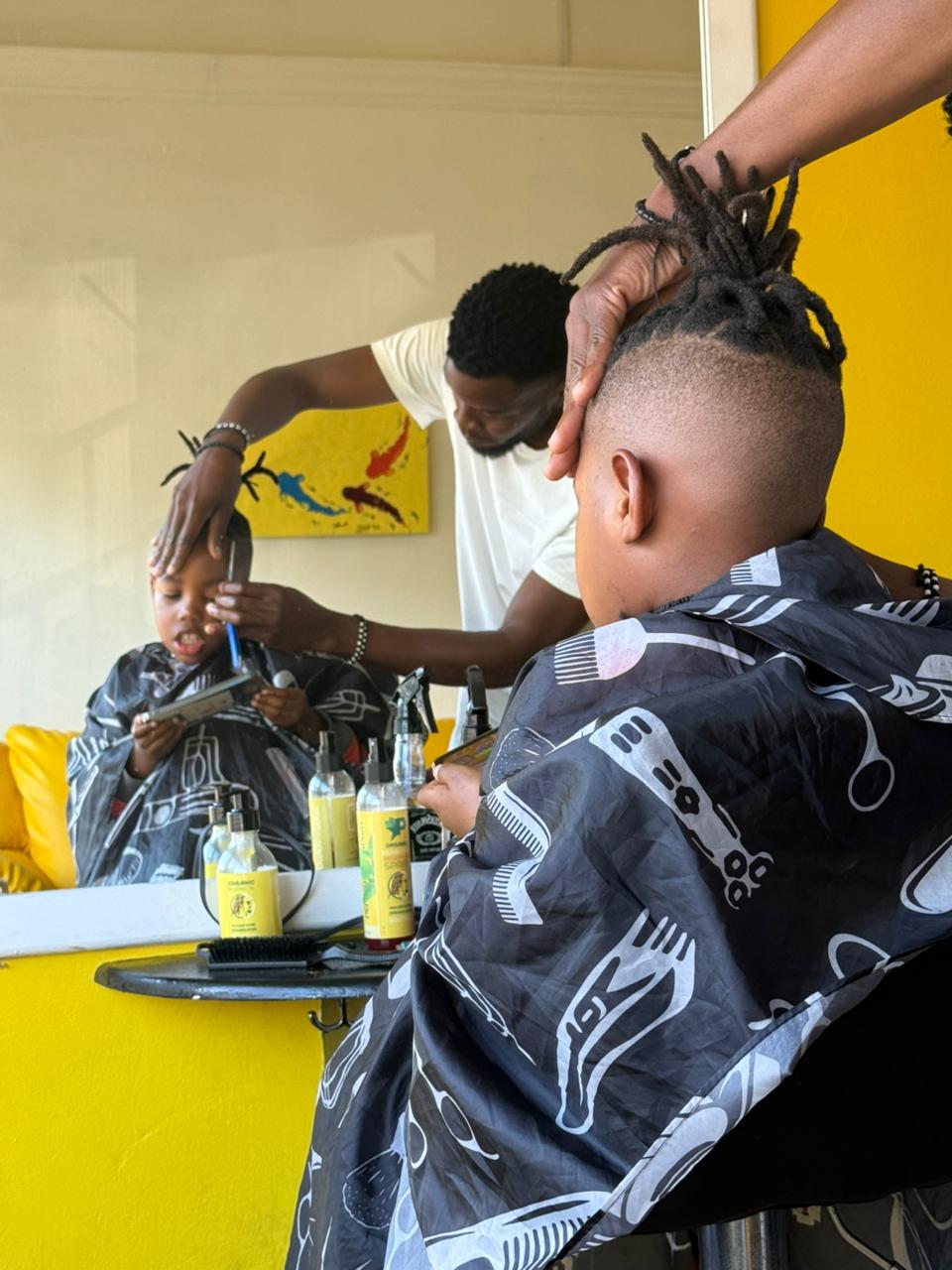 Client smiling with fresh locs